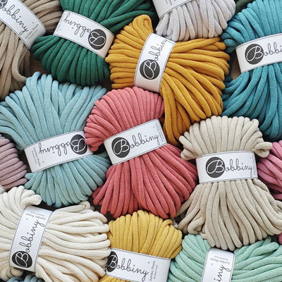 lots of skeins of bright cotton yarn
