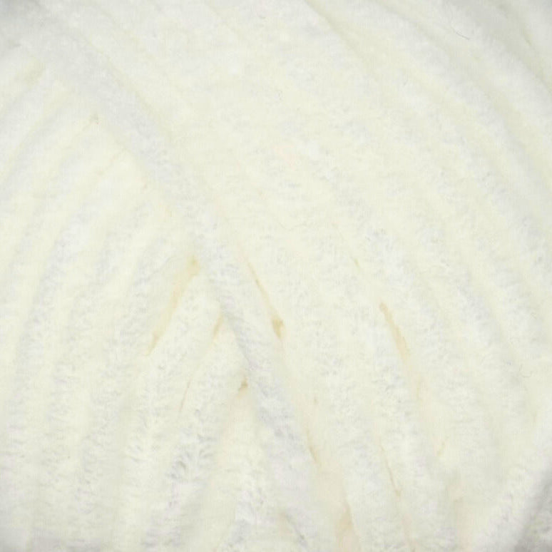 A close-up of fluffy white velvet yarn with soft, textured vertical loops.