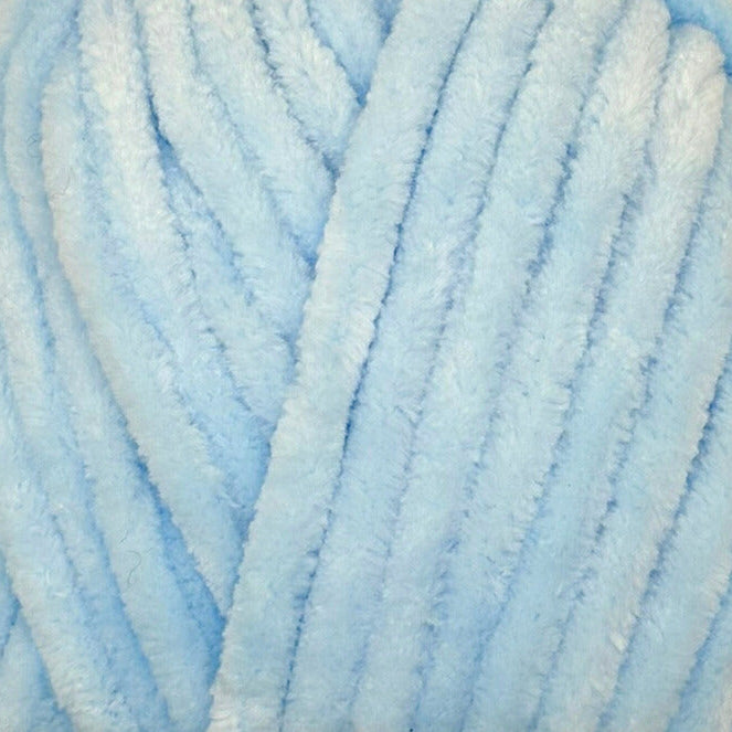 A close-up of light blue fuzzy chenille yarn strands, showing the soft plush texture and twisted loops of the material.
