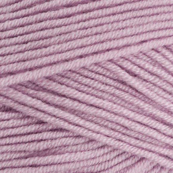 Close-up of pink yarn with visible texture