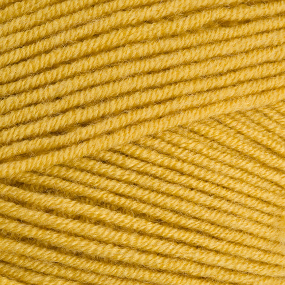 Close-up of yellow yarn with a textured pattern