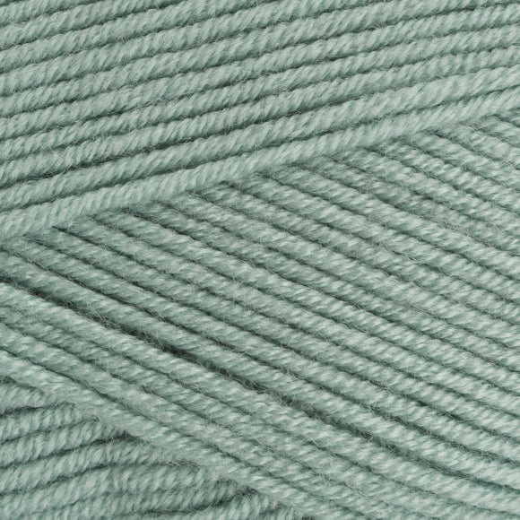 Close-up of teal yarn with visible texture