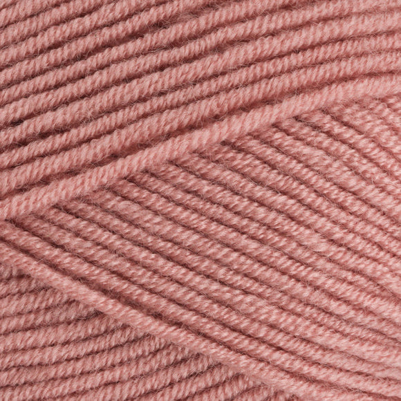 Close-up of pink yarn with a textured pattern