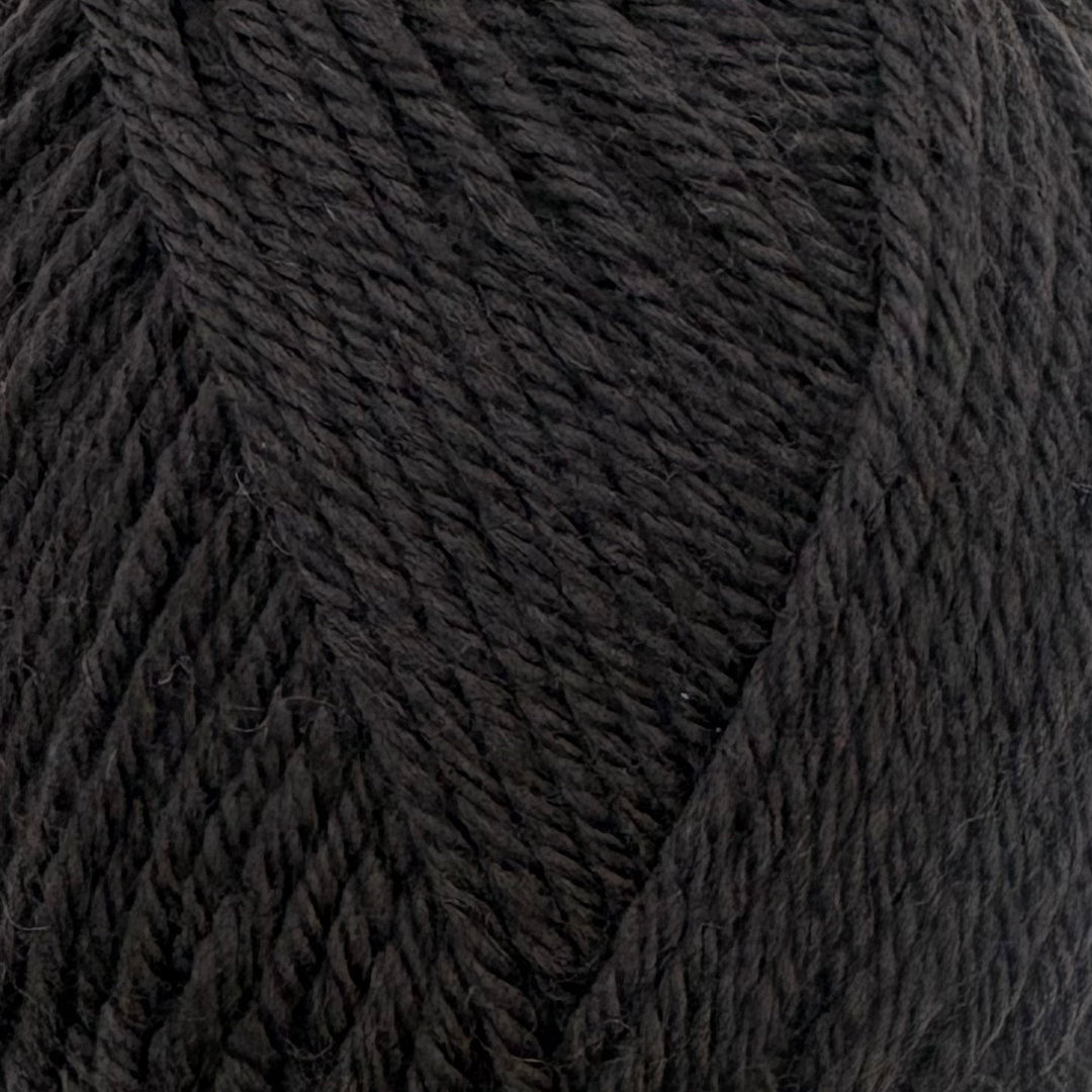 A close-up of dark charcoal gray twisted yarn, showing the detailed texture of the plies.