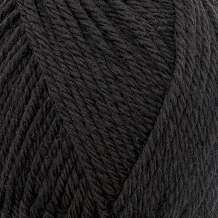 A close-up of dark charcoal gray twisted yarn, showing the detailed texture of the plies.