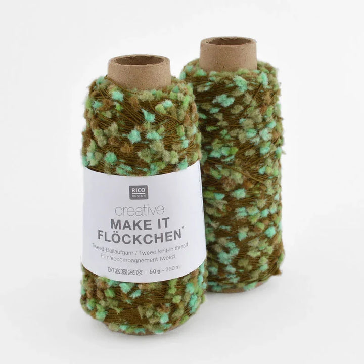 Two spools of Rico Design creative Make It Flockchen yarn, featuring a variegated pattern of olive green, brown, and mint green, with a white paper label on a clean white background.