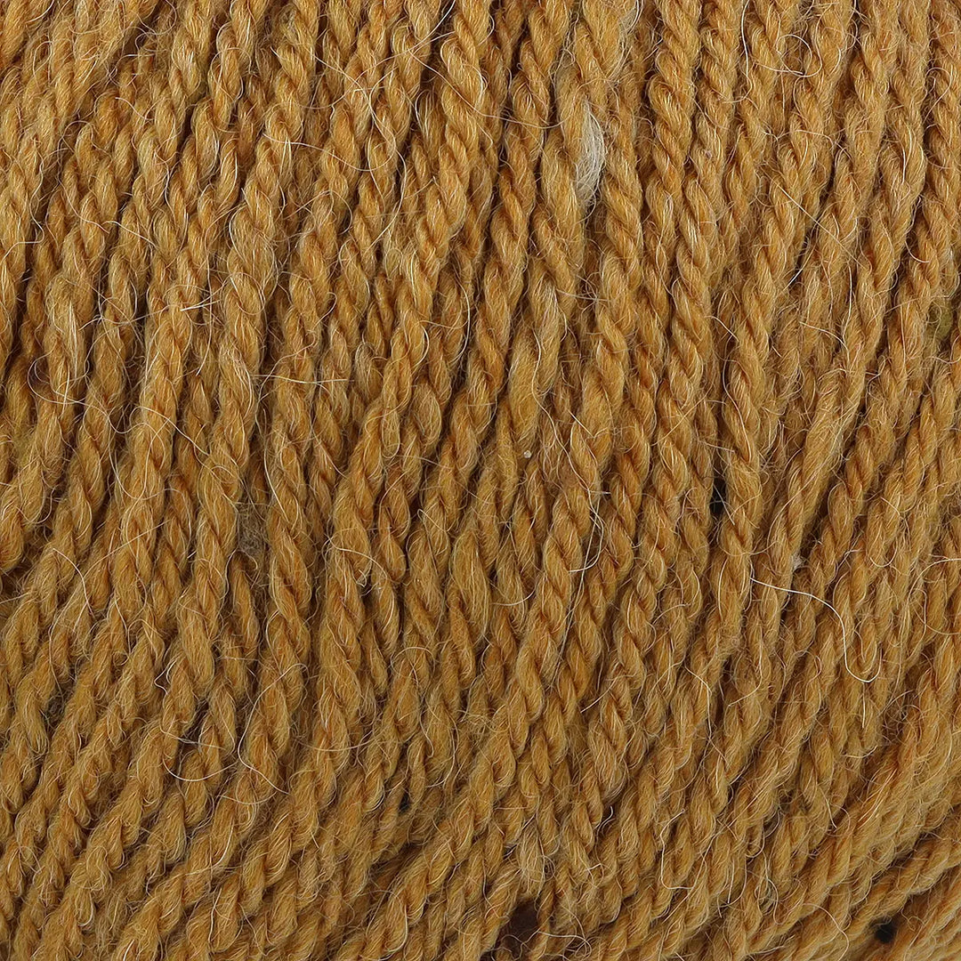 Close-up of brown yarn with visible texture