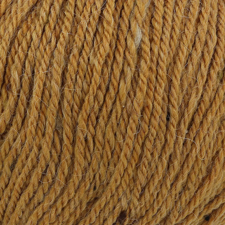 Close-up of brown yarn with visible texture