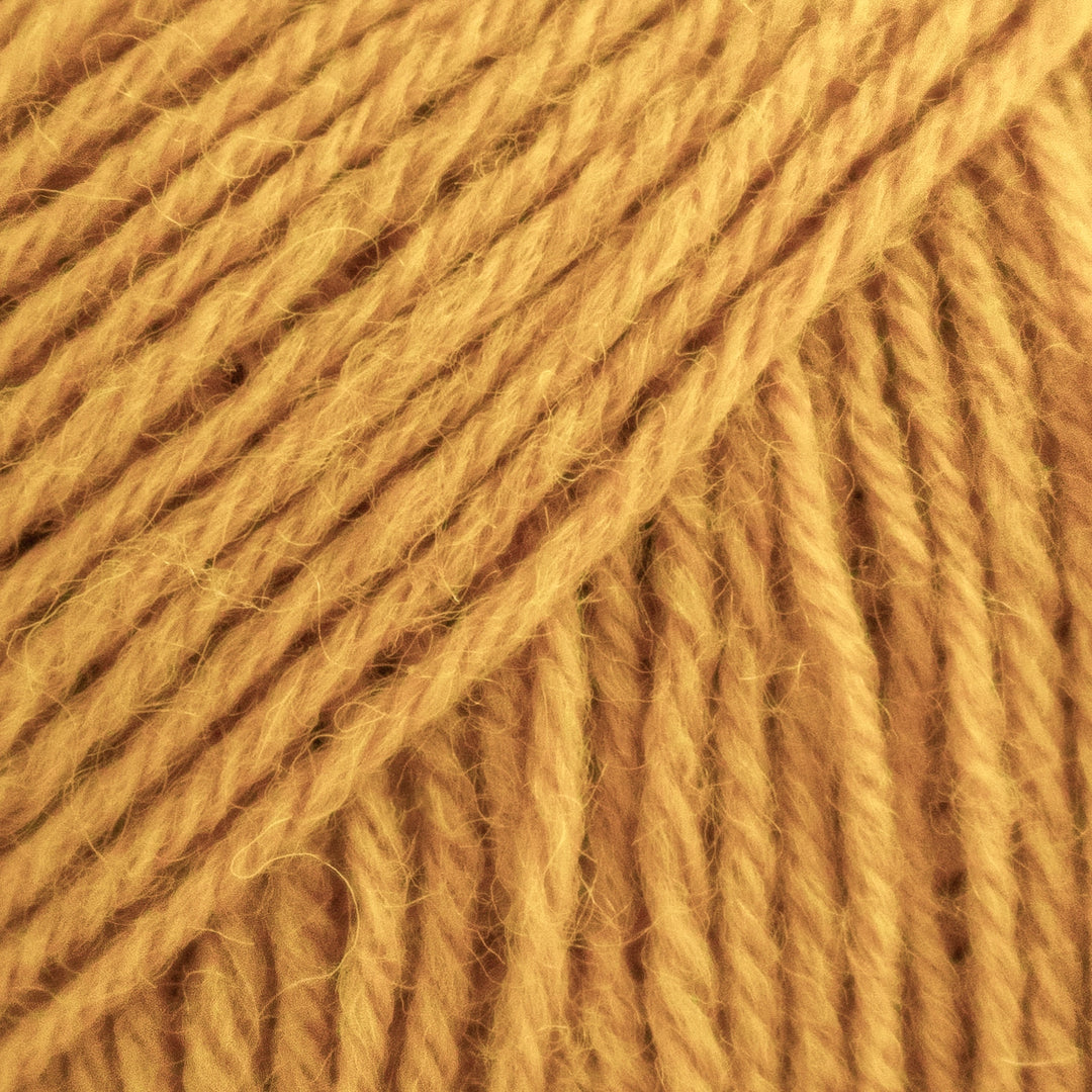 Close-up of a ball of orange yarn