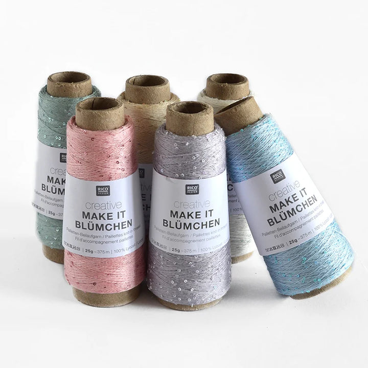 Set of yarn spools with &