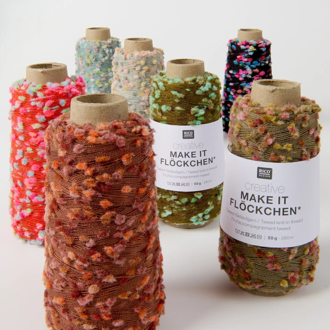 Six spools of Rico Design 'creative MAKE IT FLOCHKEN' yarn arranged on a white background. The yarns come in various colors and patterns, including solid orange-brown, multicolor pink/blue, green, black/pink, and olive green/yellow.