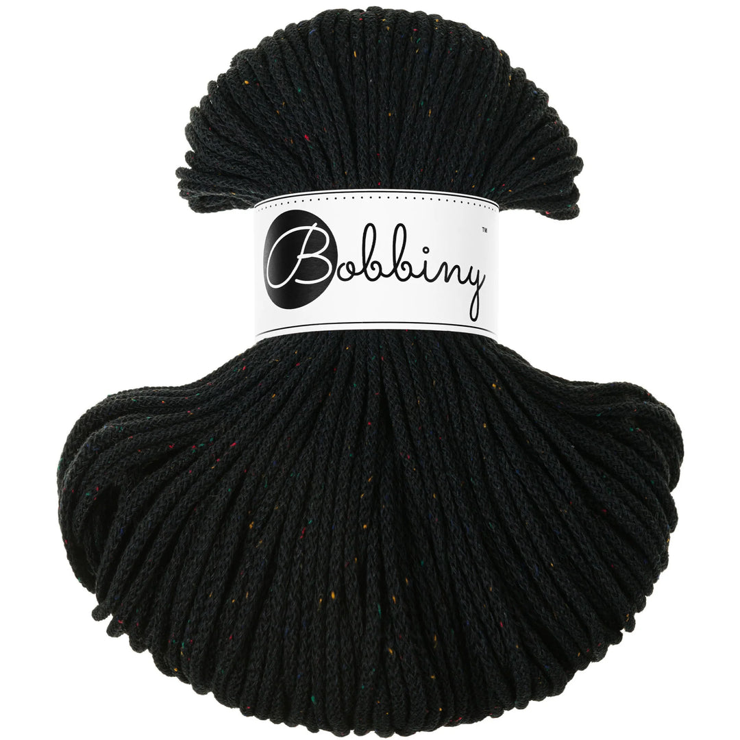 Black skein of yarn with 'Bobbiny' label on a white background