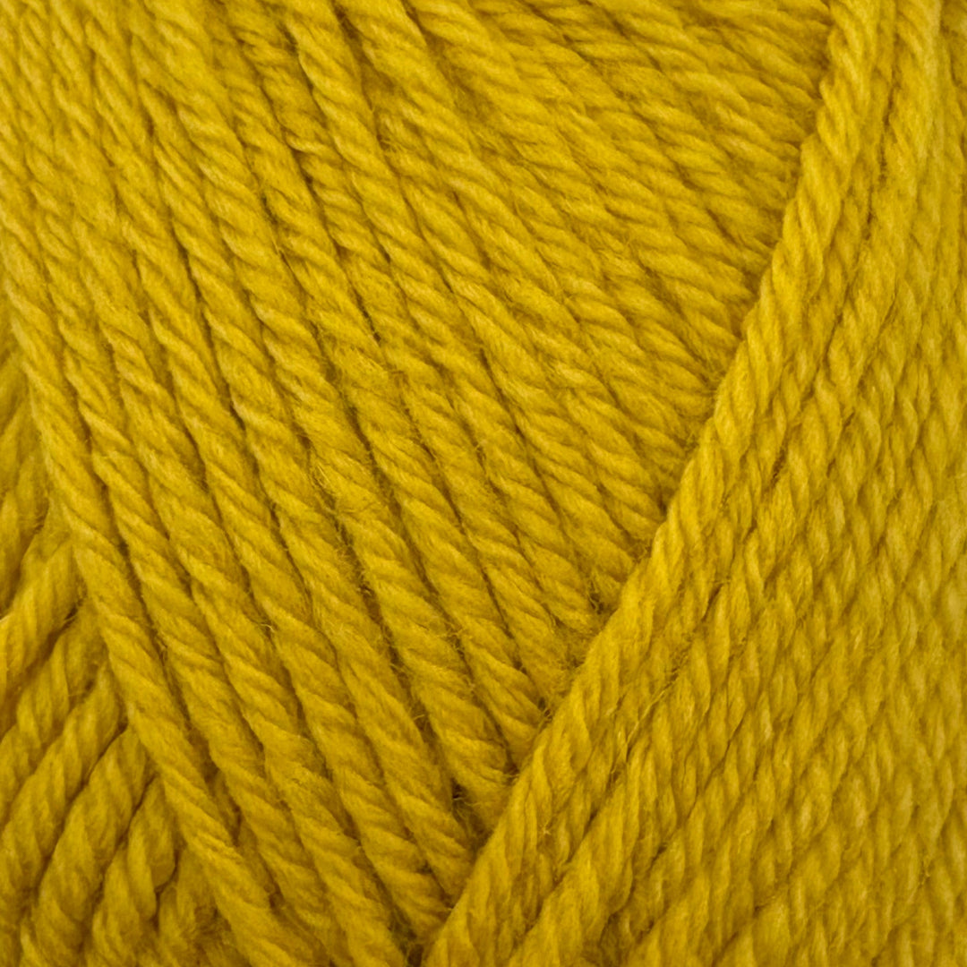 A close-up of bright mustard yellow yarn strands wound together, showing the twisted fiber texture in a warm golden-yellow color.