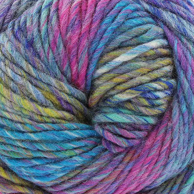 Multicolored skein of yarn on a white background