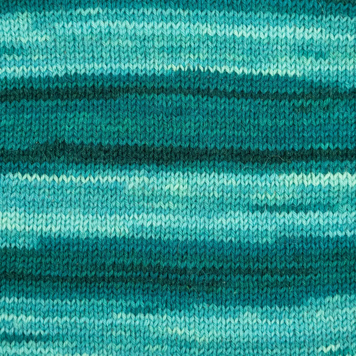 Close-up of teal and green striped fabric texture