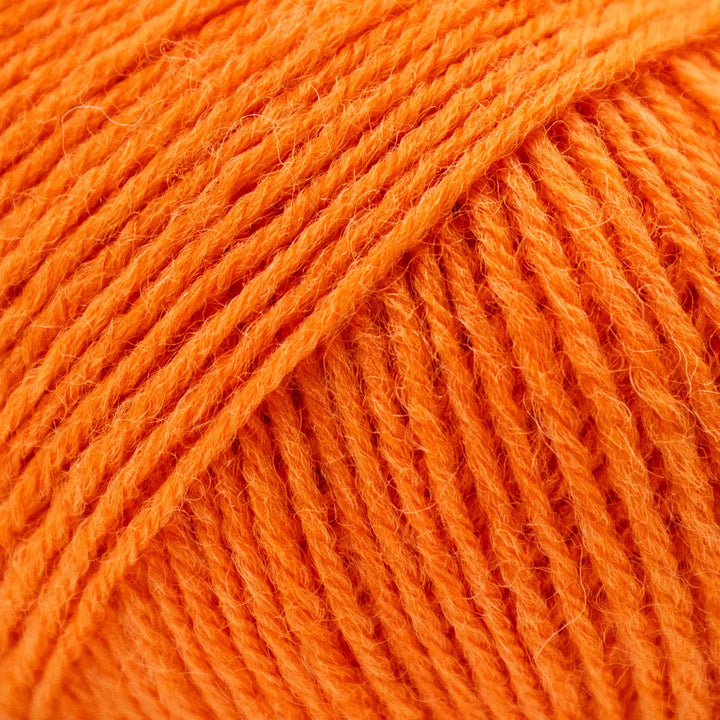 Close-up of bright orange yarn