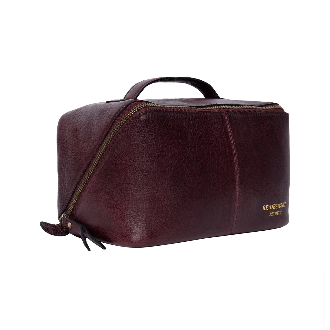 Brown leather yarn bag with visible brand name on a white background