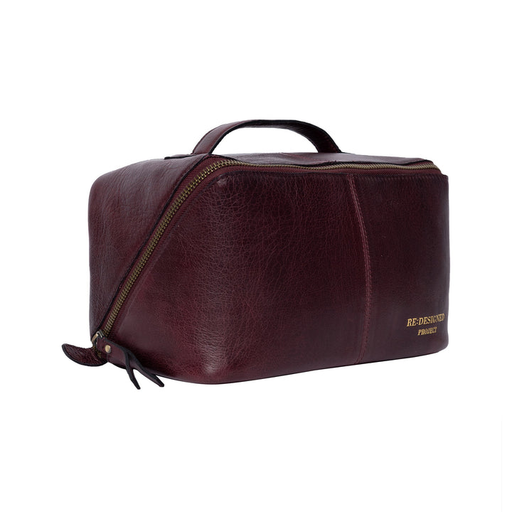 Brown leather yarn bag with visible brand name on a white background