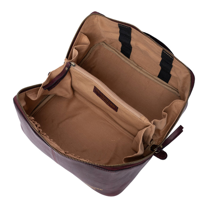 Open brown leather bag on a white background