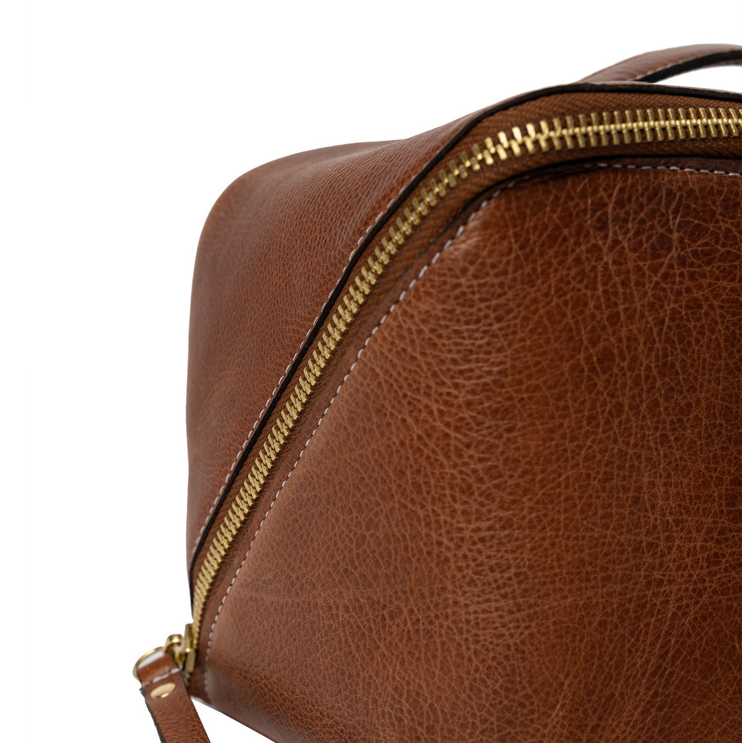 Brown leather yarn bag with gold zipper on a white background