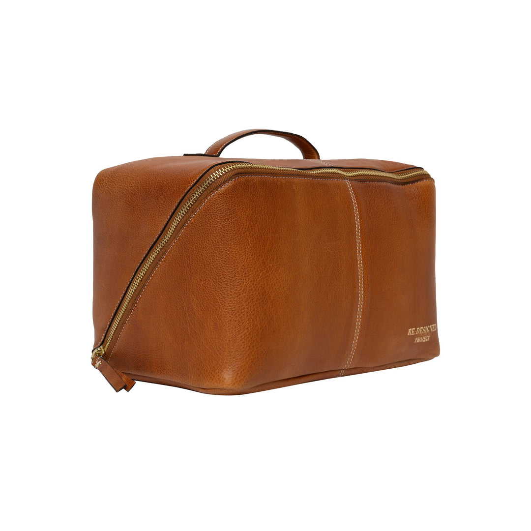 Brown leather bag with gold zipper on a white background