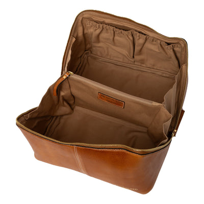 Brown leather travel bag with open compartments on a white background