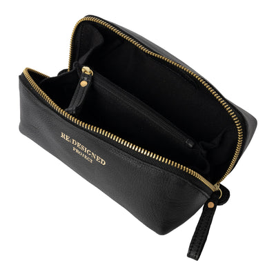 Black pouch with gold zipper and 'RE-DESIGNED' branding on a white background