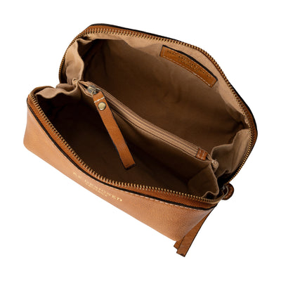 Brown leather toiletry bag with open lid on a white background