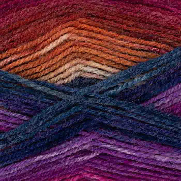 Multicolored yarn skein with gradient from purple to orange.