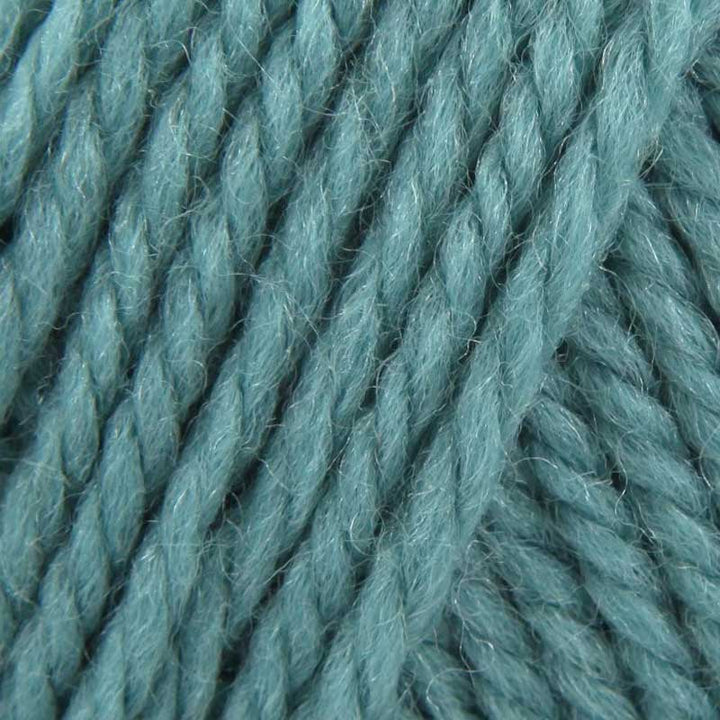 A close-up texture shot of twisted yarn in a dusty teal blue-green color, filling the entire frame.