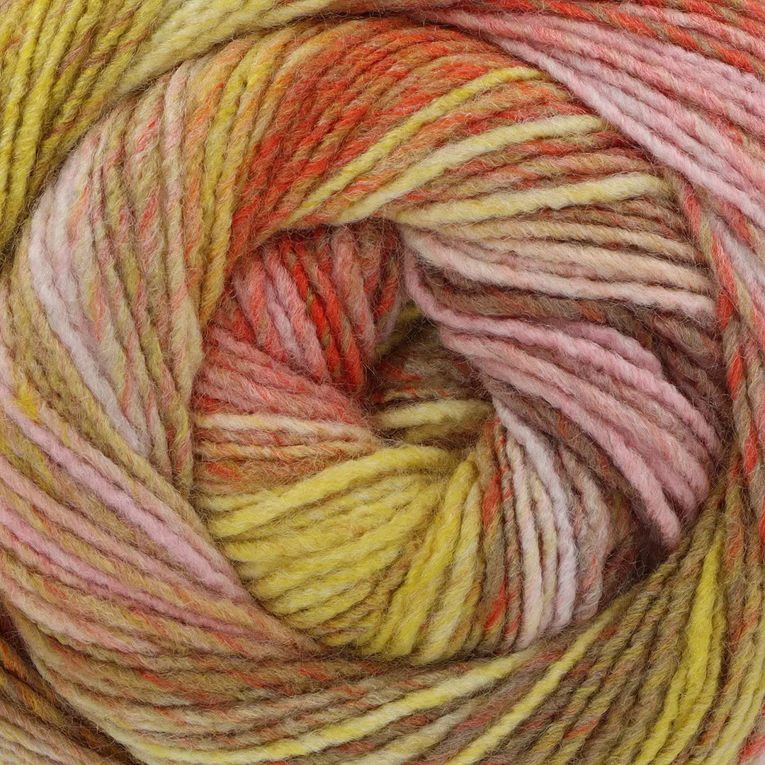 Close-up of a skein of multicolored yarn with shades of pink, yellow, and orange.