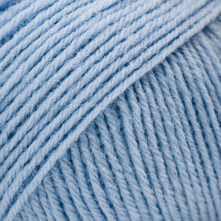 Close-up of blue yarn with a textured surface