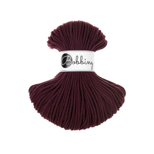 Burgundy yarn skein with 'Bobbiny' label on a white background