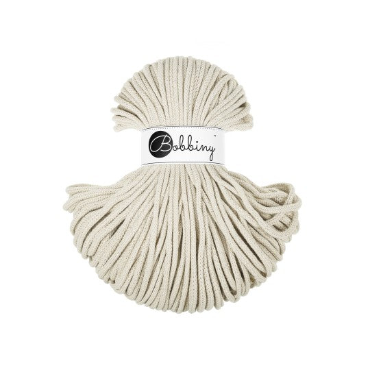 Beige ball of yarn with 'Bobbiny' label on a white background