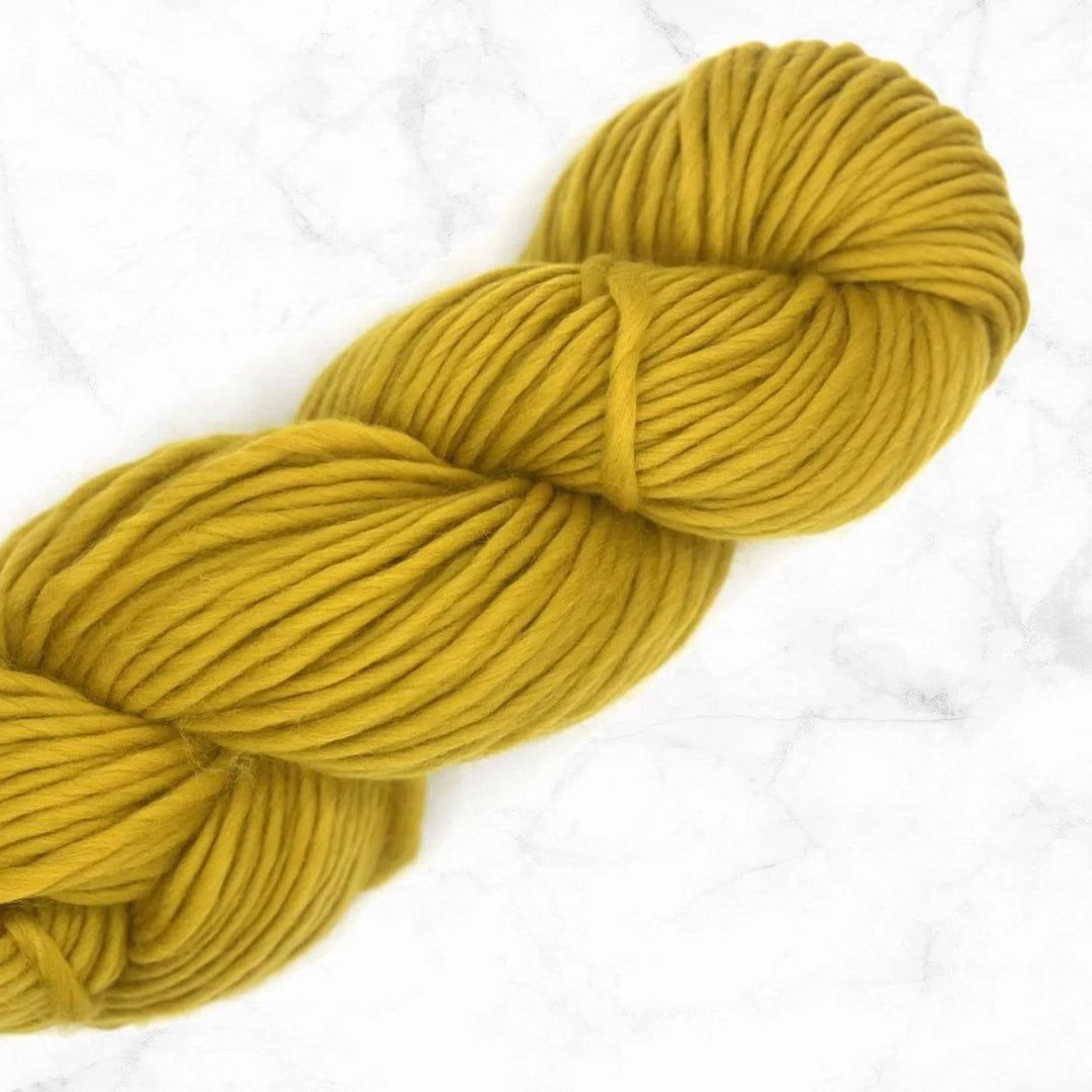 skein of mustard super chunky yarn