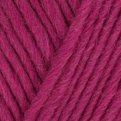 Close-up of pink yarn with a textured pattern