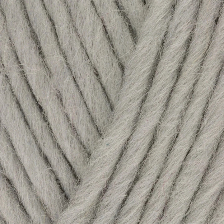 Close-up of gray yarn with visible texture
