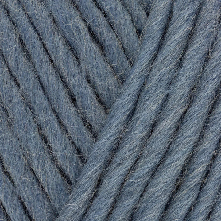 Close-up of blue yarn with a textured pattern