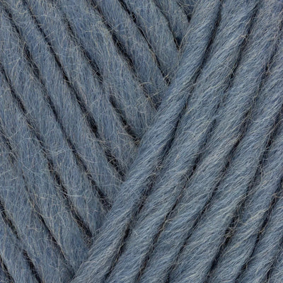 Close-up of blue yarn with a textured pattern