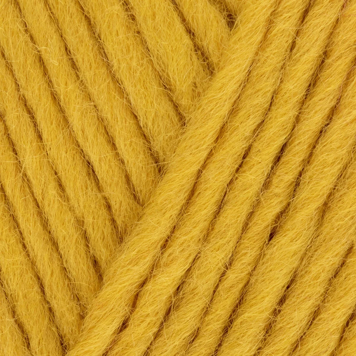 Close-up of a ball of yellow yarn