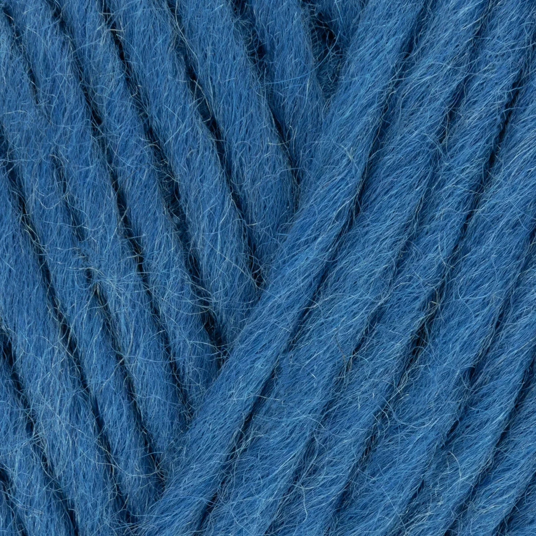 Close-up of blue yarn with a textured surface