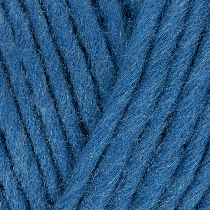 Close-up of blue yarn with a textured surface