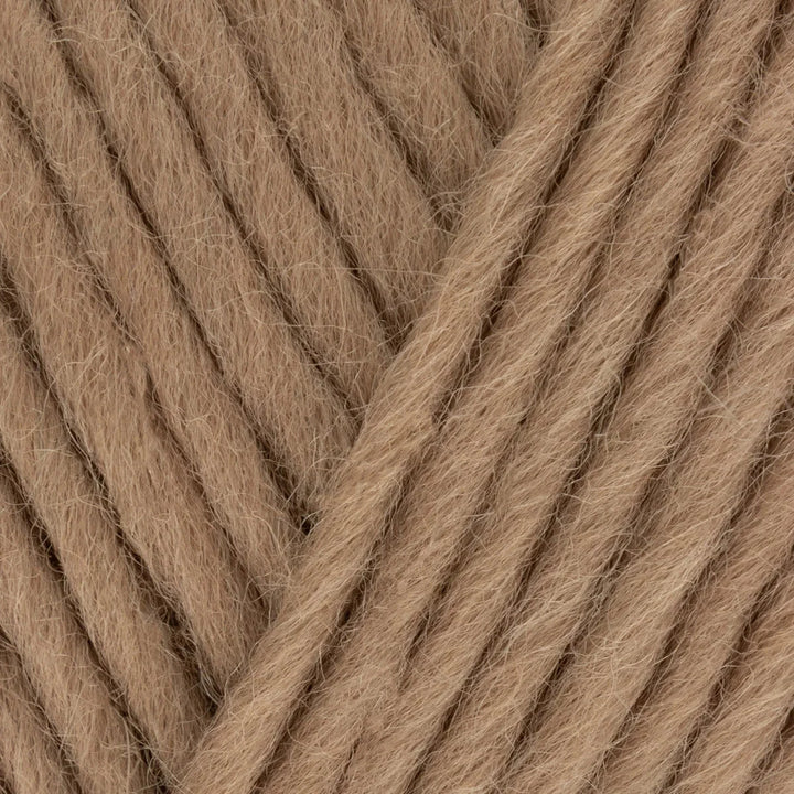 Close-up of brown yarn with a diagonal pattern