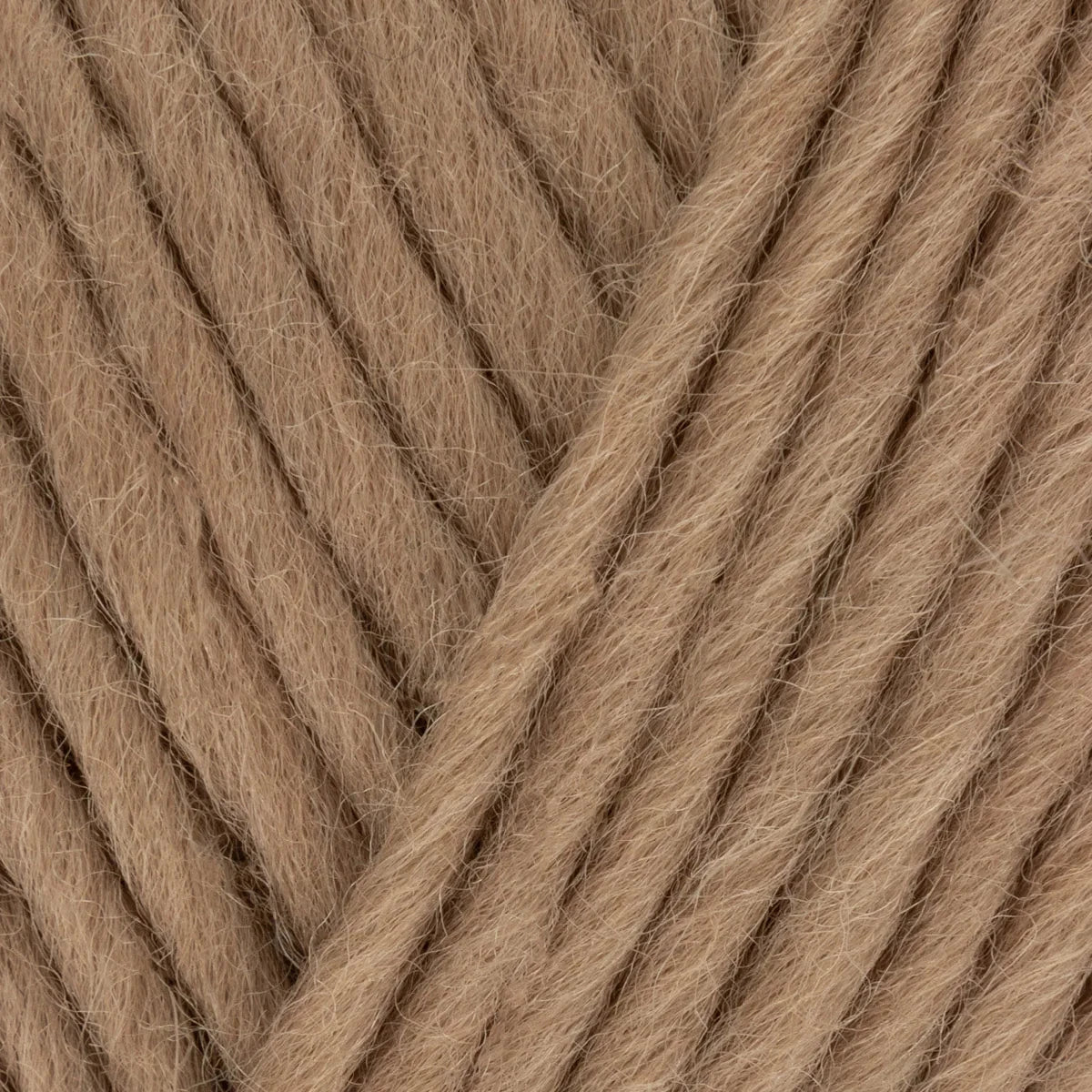 Close-up of brown yarn with a diagonal pattern