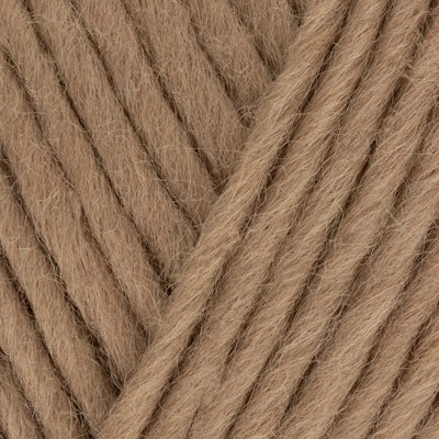 Close-up of brown yarn with a diagonal pattern