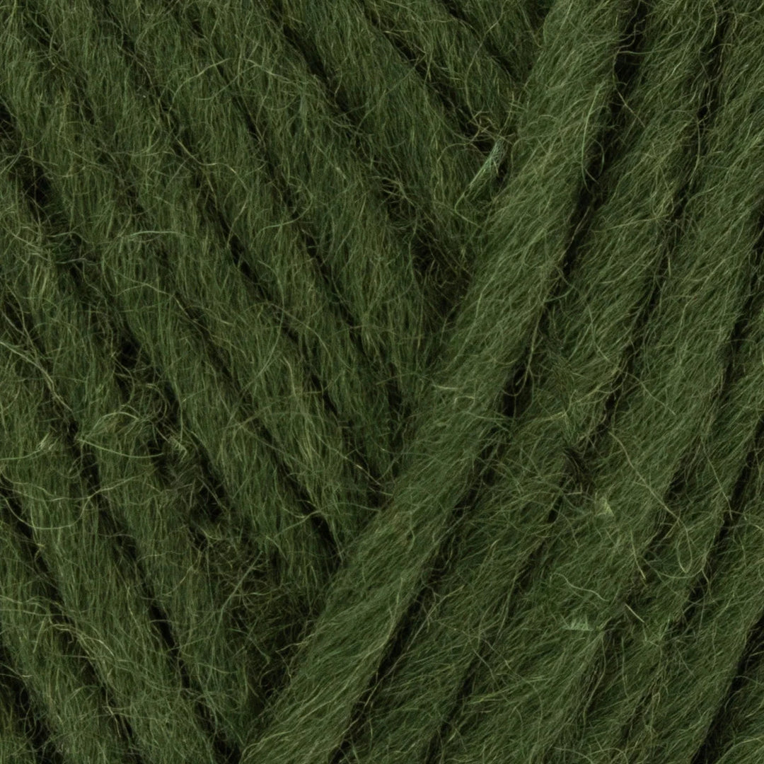Close-up of dark green yarn with visible texture