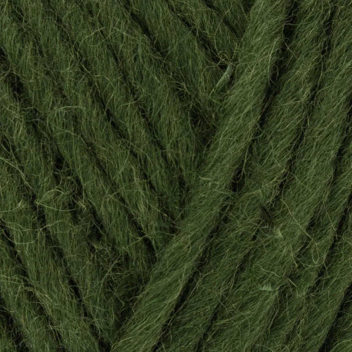 Close-up of dark green yarn with visible texture