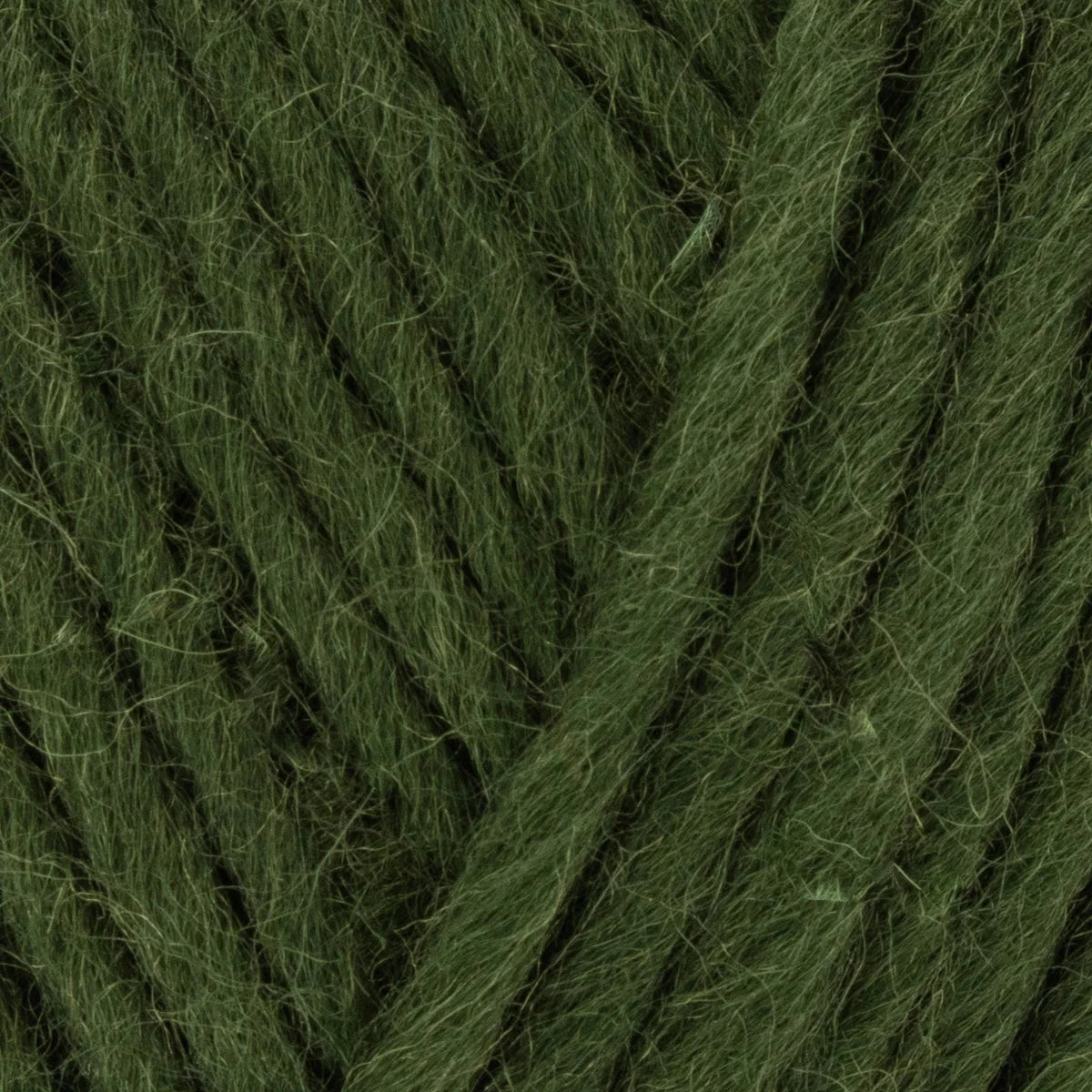 Close-up of dark green yarn with visible texture