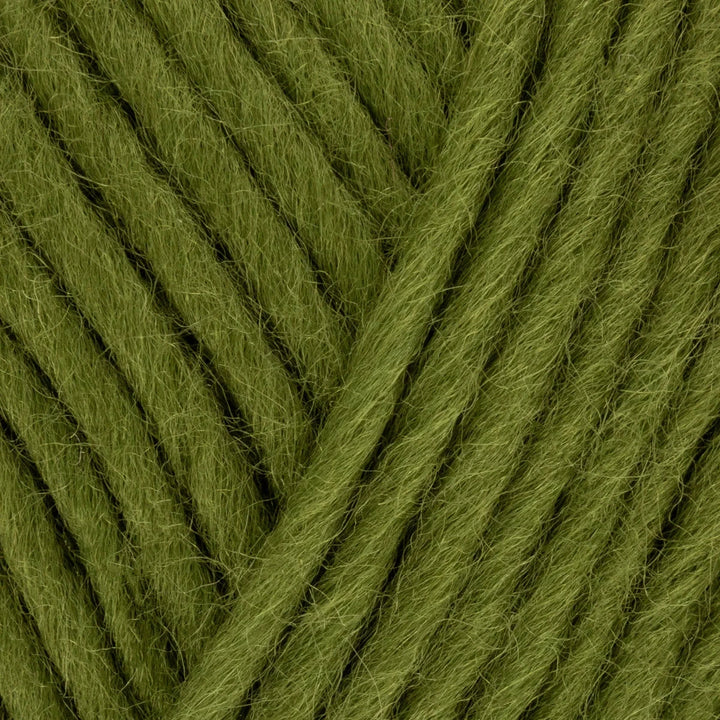 Close-up of green yarn with a skein texture