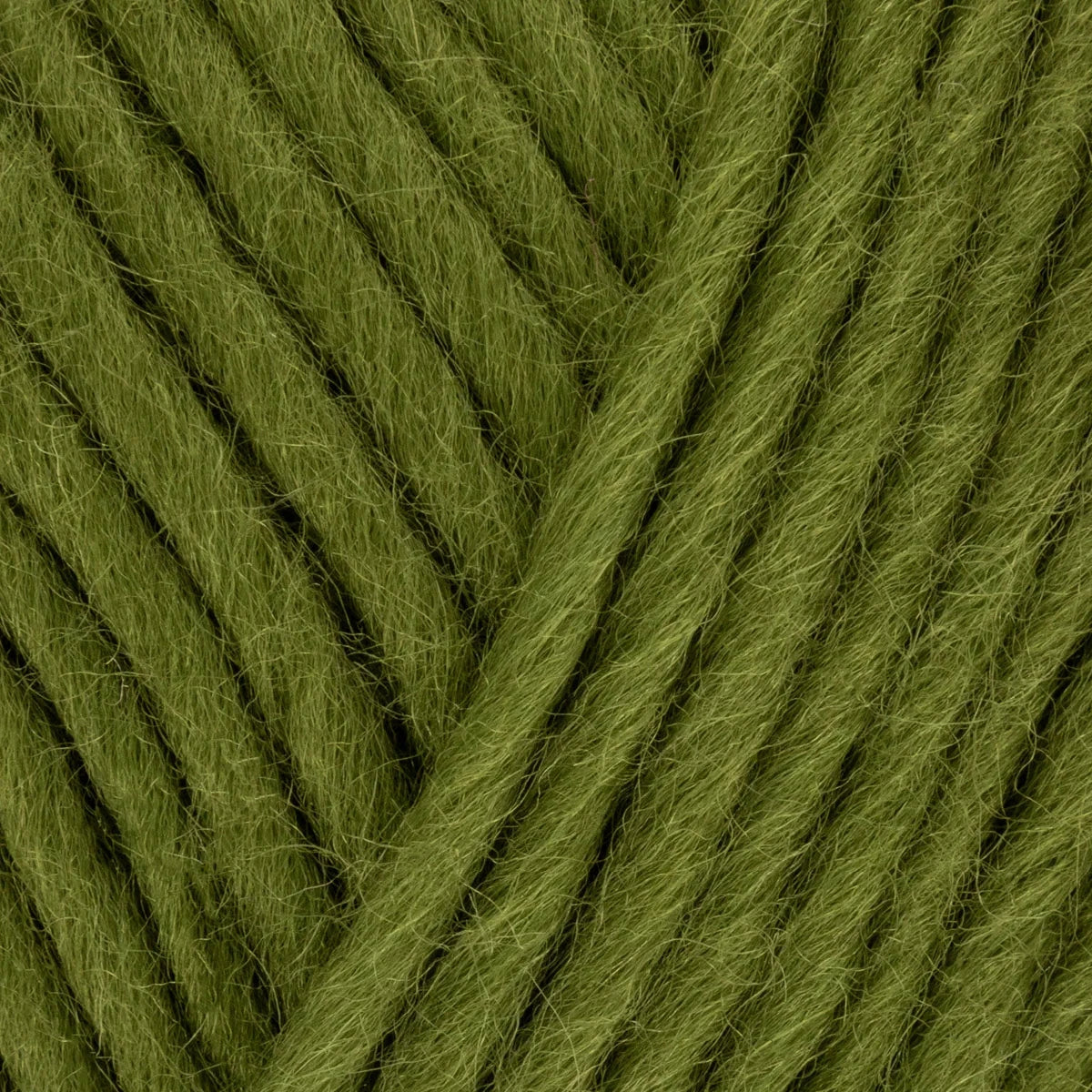 Close-up of green yarn with a skein texture